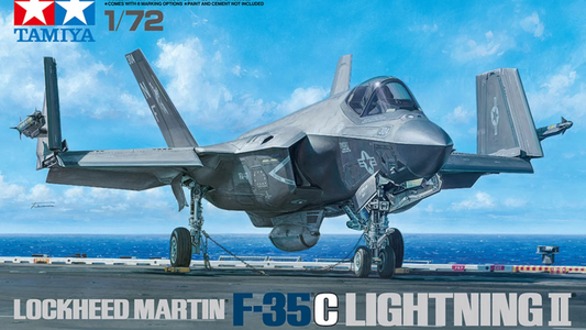 Box art illustration of Tamiya’s 1/72 F‑35C Lightning II kit showing the fighter on a carrier deck with blue sky backdrop.