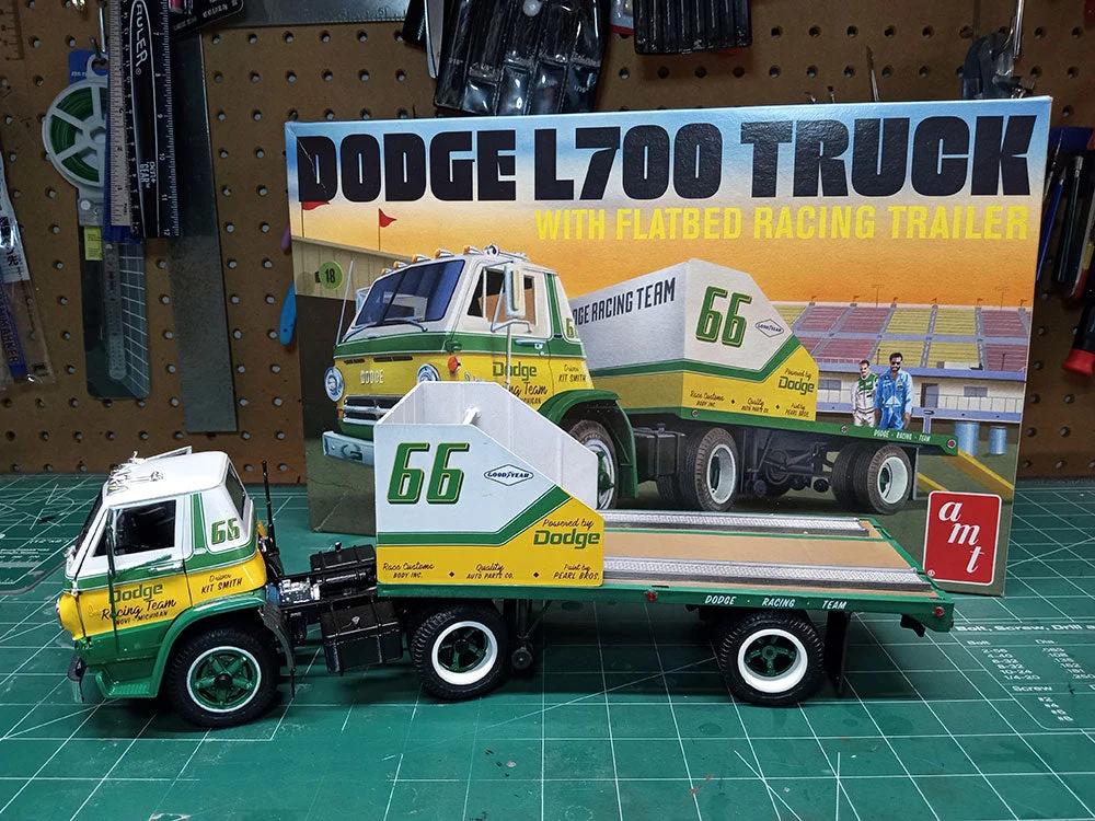 AMT 66 Dodge L700 Truck W Flatbed Race Trlr Model Kit — official product photo 2