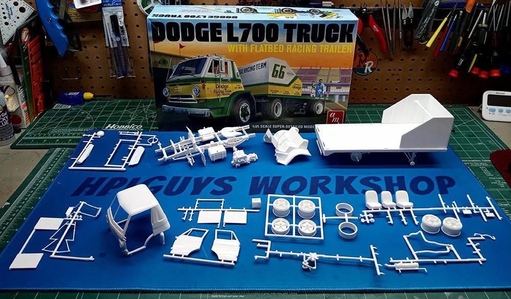 AMT 66 Dodge L700 Truck W Flatbed Race Trlr Model Kit — official product photo 5